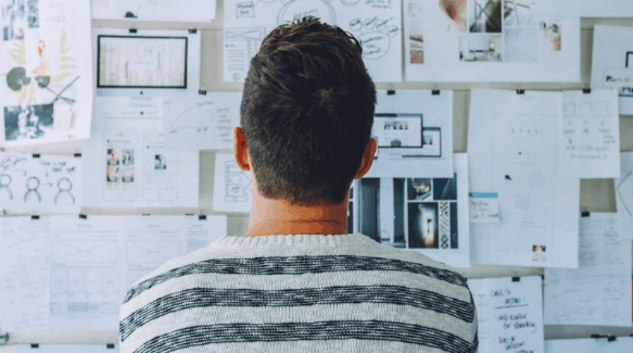 Person reviewing market research information.