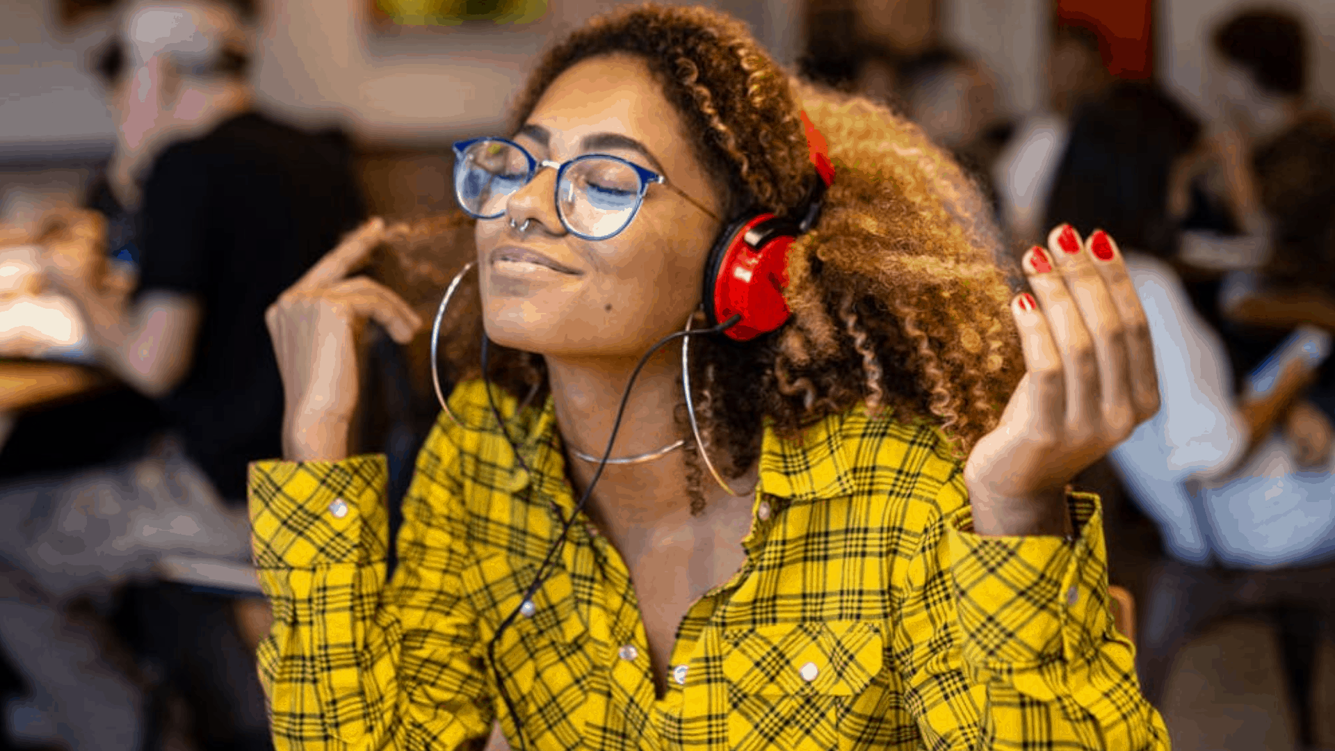 woman with headphones listening to spotify